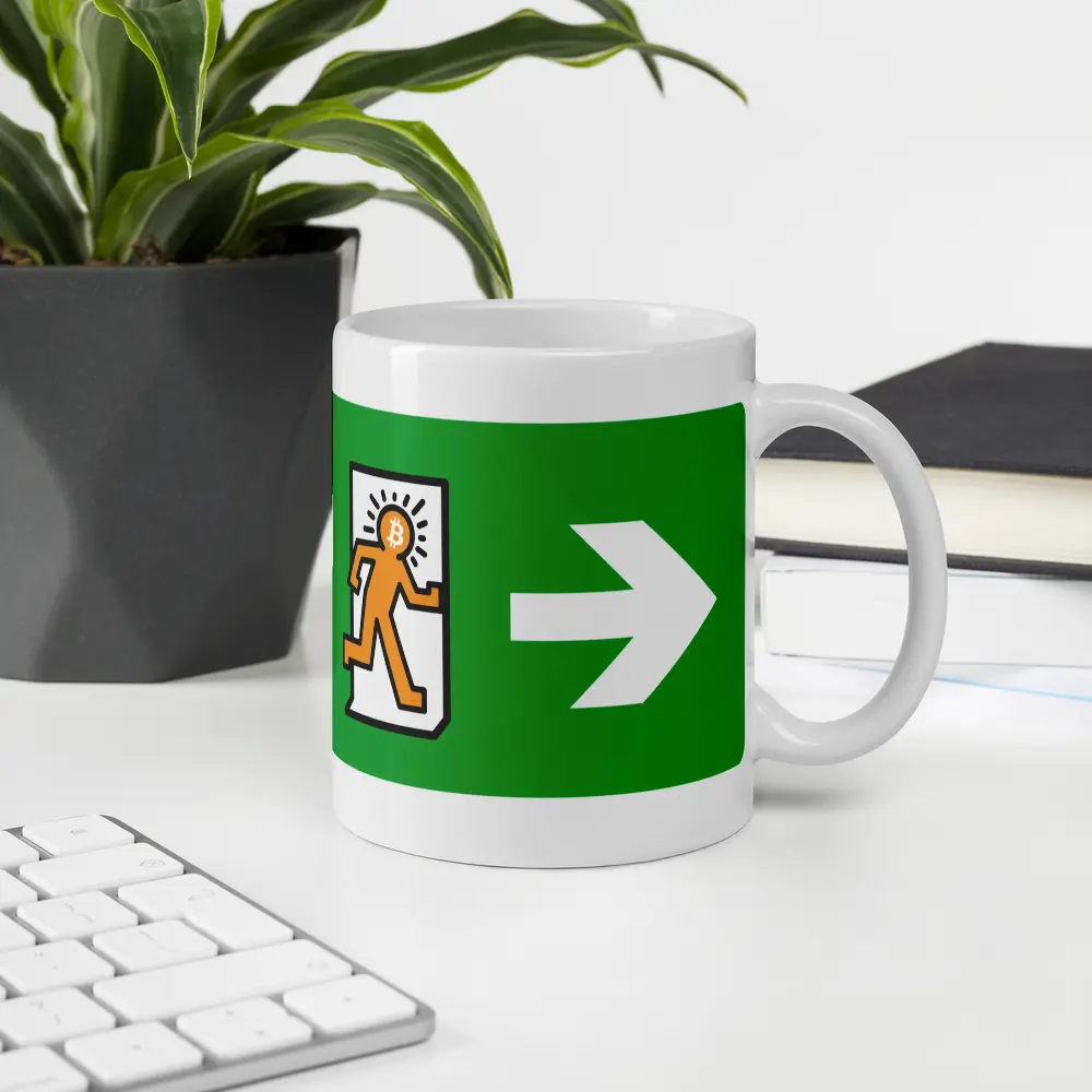 bitcoin mug - exit inflation - at office desk