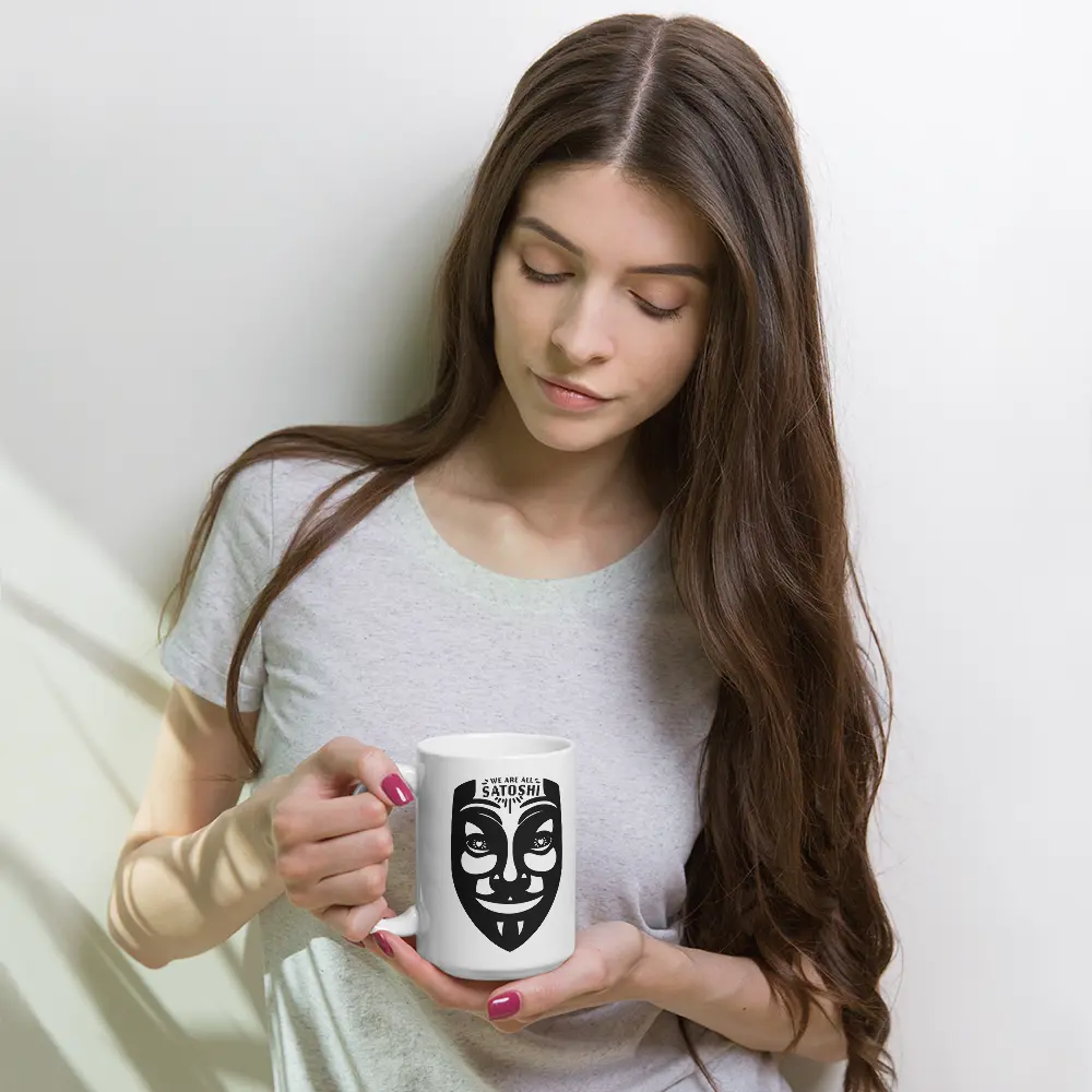 bitcoin mug - fawkes we are all satoshi - hold by female model
