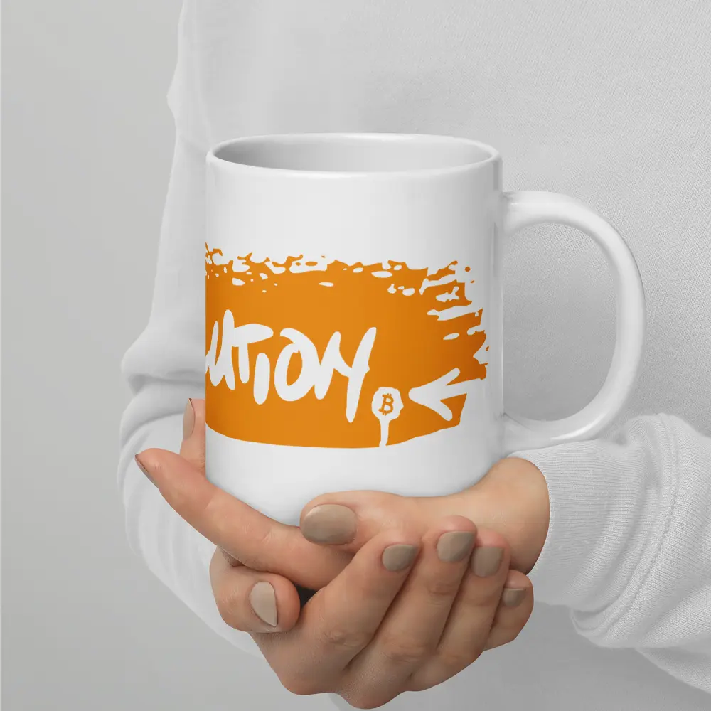 bitcoin mug - revolution orange - hold by 2 hands