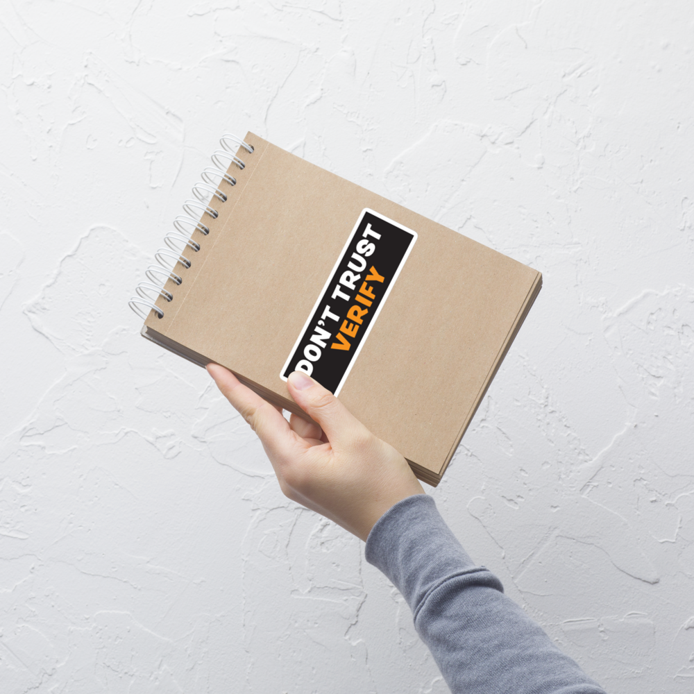 bitcoin sticker - dont trust verify - on notebook