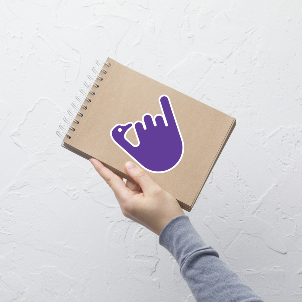 nostr sticker - hang loose - applied on notebook