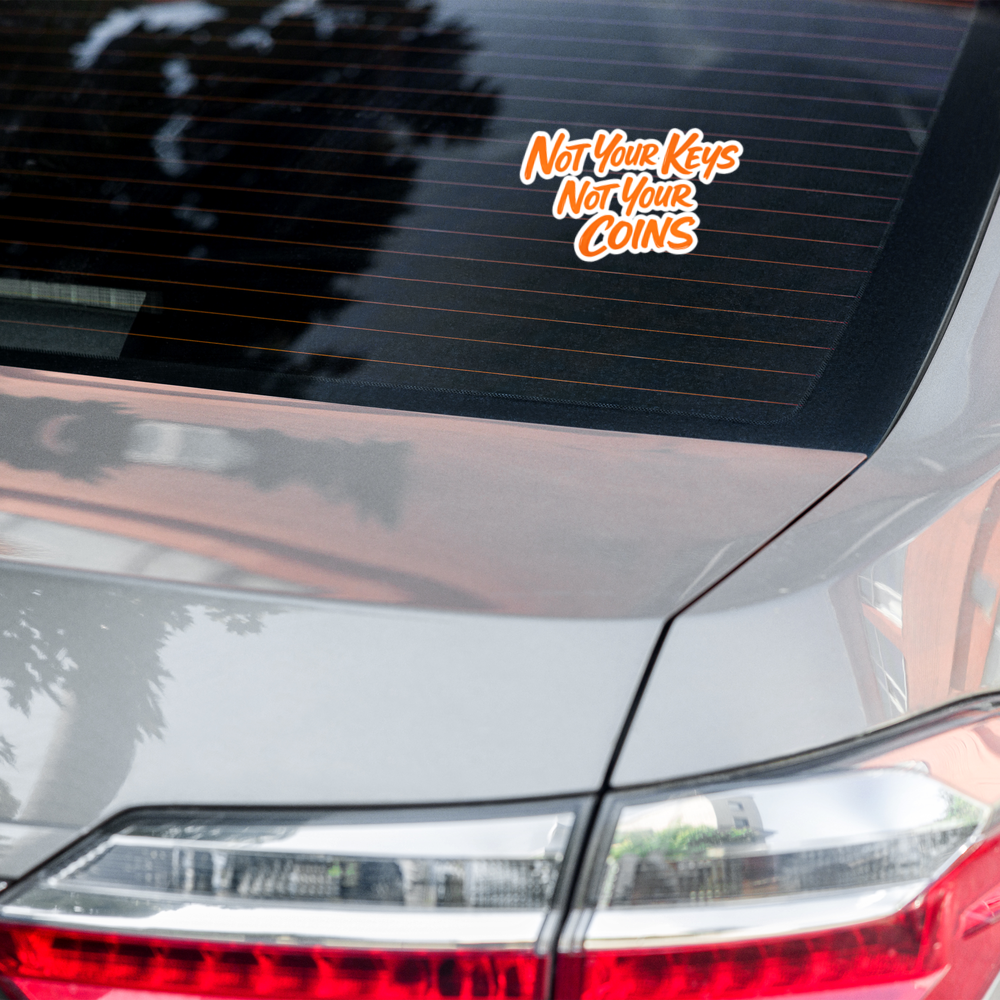 bitcoin sticker - not your keys - on car window