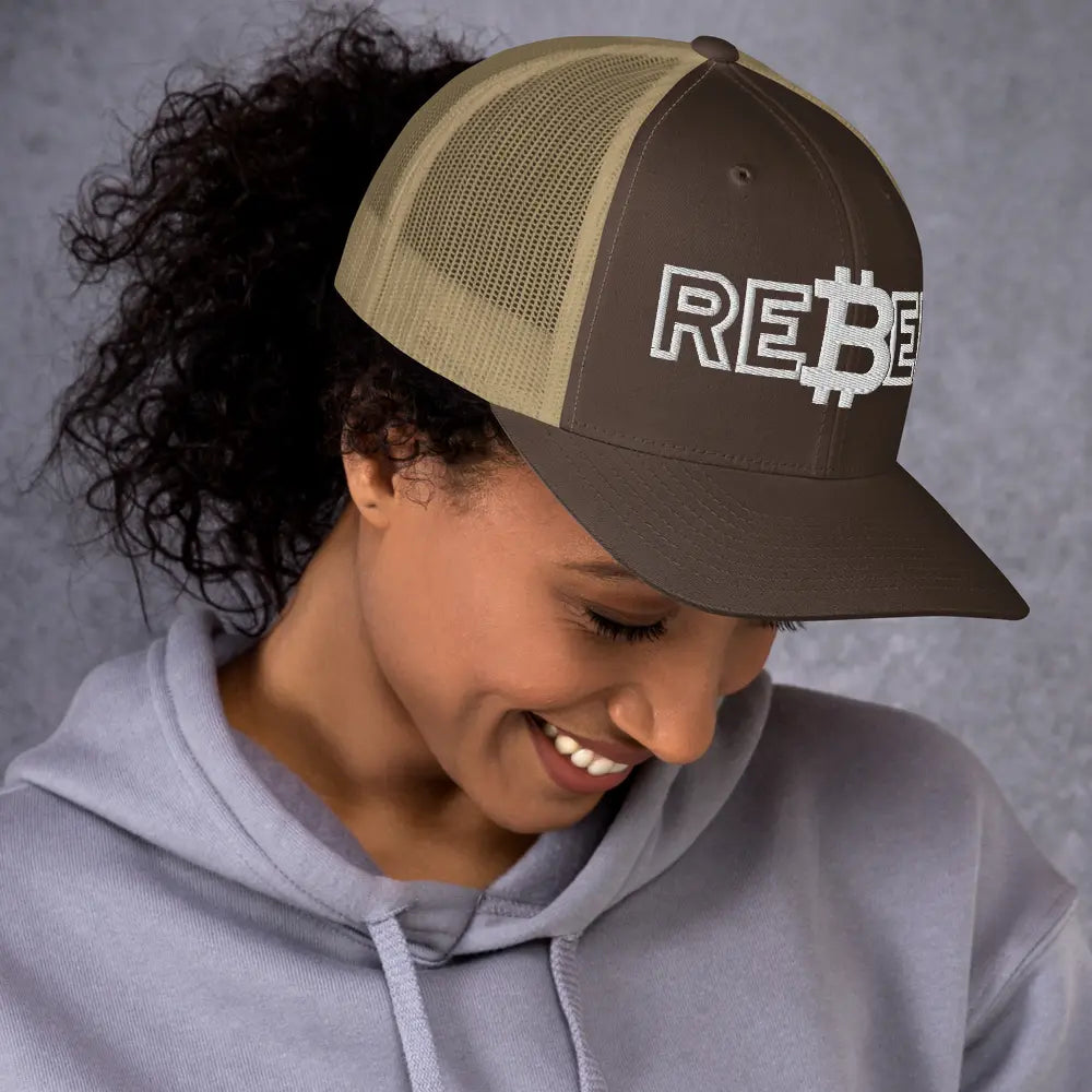 rebel bitcoin hat worn on model brown and khaki